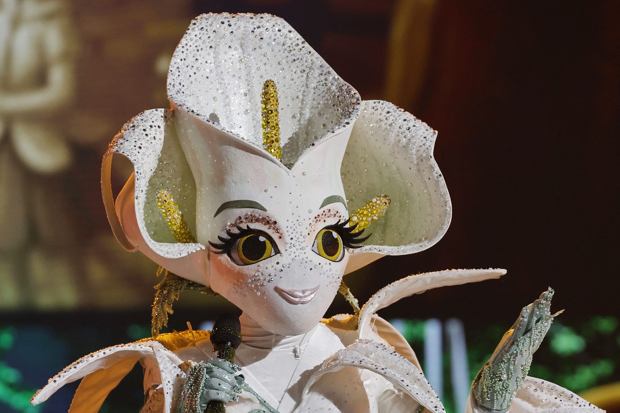 Тедди Мелленкамп в образе Каллы на шоу «Маска»