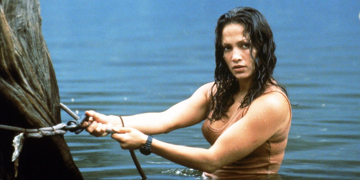 Постер фильма Анаконда 1997 года с изображением змея и главных героев.